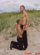 Hard anal fuck of two hot studs on the beach